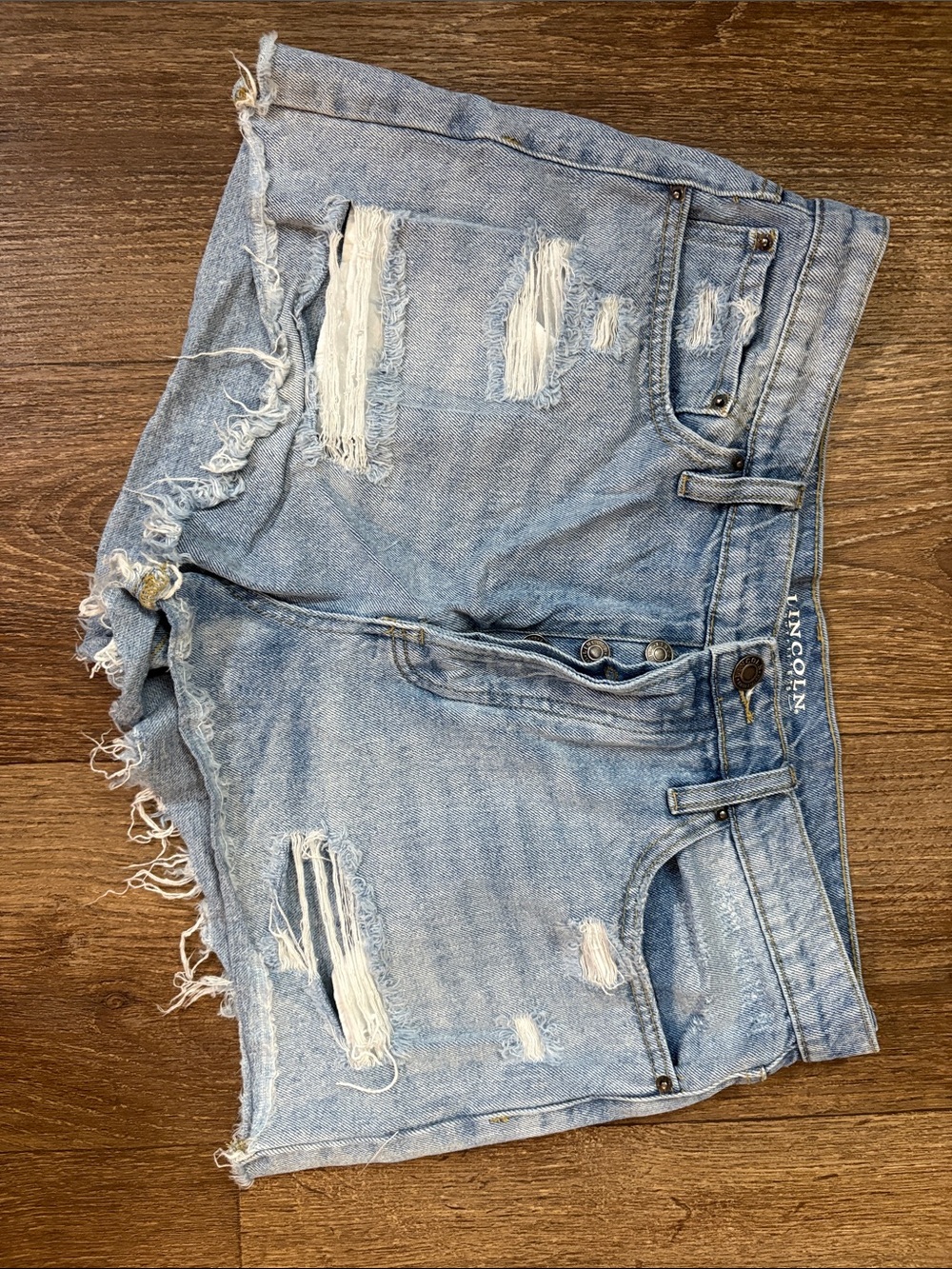 Light Wash Distressed Denim Jean Shorts by LINCOLN